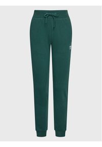Adidas - adidas Spodnie dresowe adicolor Essentials HS6781 Zielony Slim Fit. Kolor: zielony. Materiał: syntetyk #1