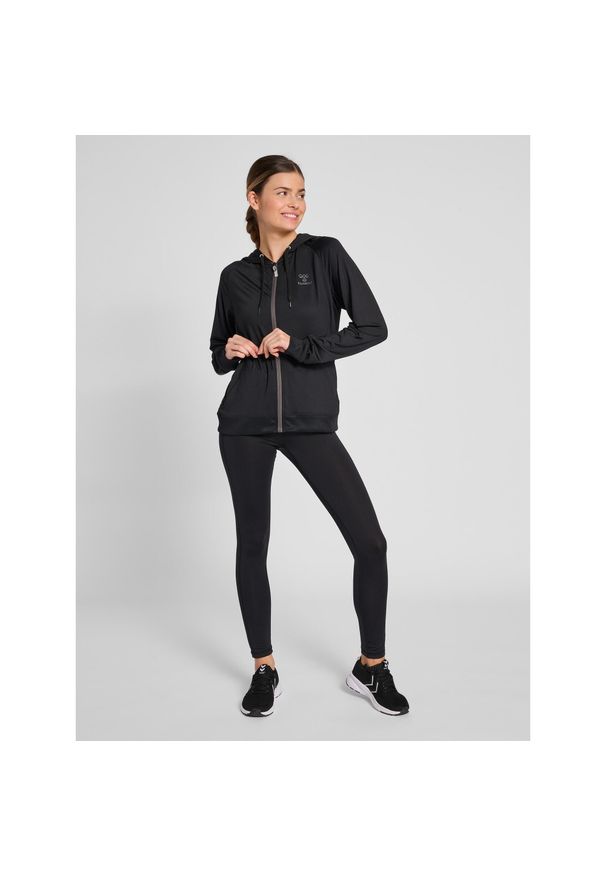 Damskie pełne legginsy Hummel q4 Hw. Kolor: czarny. Materiał: materiał. Wzór: jodełka, nadruk. Sport: fitness