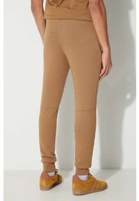 Lacoste spodnie dresowe męskie kolor brązowy gładkie. Kolor: brązowy. Materiał: dresówka. Wzór: gładki #5