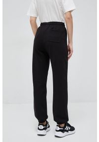 Champion spodnie dresowe kolor czarny gładkie. Kolor: czarny. Materiał: dresówka. Wzór: gładki #2