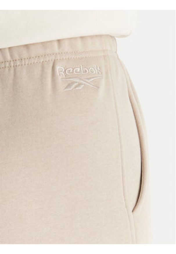 Reebok Spodnie dresowe Reebok X Ewa Chodakowska Evren RK25308CCW Beżowy Regular Fit. Kolor: beżowy. Materiał: syntetyk