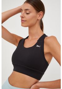 Reebok biustonosz sportowy Running Essentials kolor czarny gładki. Kolor: czarny. Materiał: poliester, skóra, dzianina, materiał. Wzór: gładki. Sport: bieganie #1