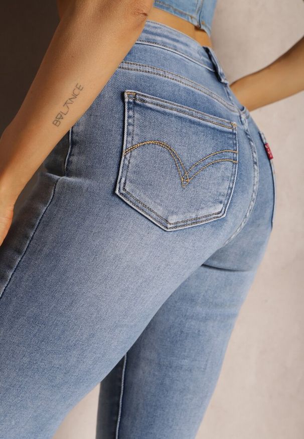 Renee - Jasnoniebieskie Jeansy High Waist o Dopasowanym Fasonie Skinny Langrea. Stan: podwyższony. Kolor: niebieski. Styl: elegancki, klasyczny
