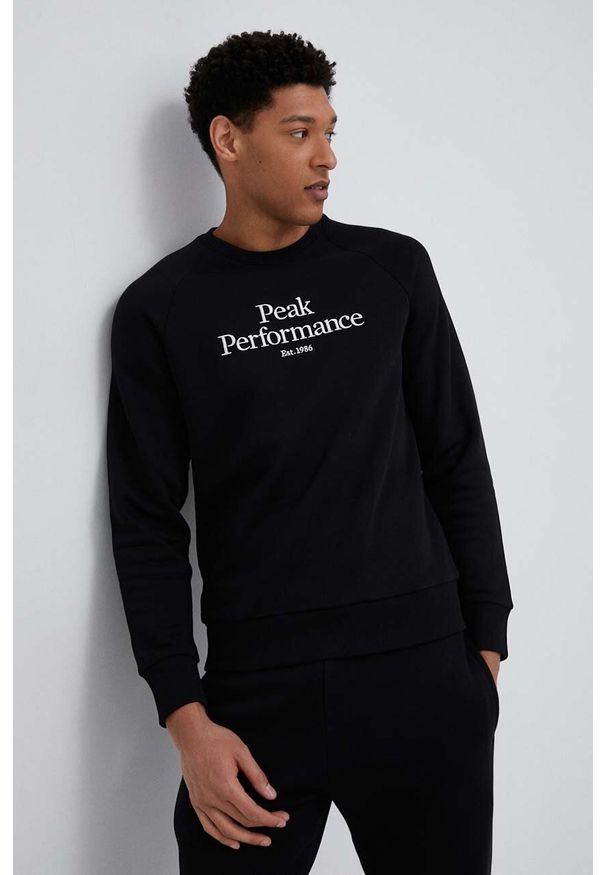 Peak Performance bluza męska kolor czarny gładka. Okazja: na co dzień. Kolor: czarny. Materiał: bawełna. Długość rękawa: raglanowy rękaw. Wzór: gładki. Styl: casual