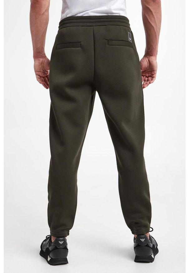 Emporio Armani - Spodnie dresowe męskie EMPORIO ARMANI. Materiał: dresówka