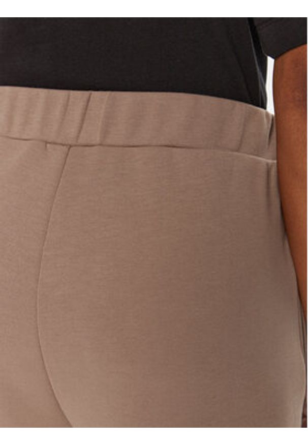 Calvin Klein Spodnie dresowe Satin K20K207945 Beżowy Slim Fit. Kolor: beżowy. Materiał: syntetyk, bawełna