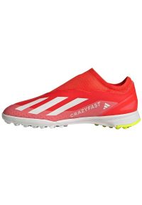 Adidas - Buty piłkarskie adidas X Crazyfast League Ll Tf Jr IF0687 czerwone. Kolor: czerwony. Materiał: syntetyk, guma. Sport: piłka nożna