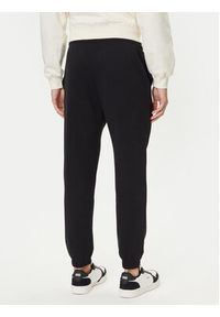 Jack & Jones - Jack&Jones Spodnie dresowe Kane Billy 12283257 Czarny Relaxed Fit. Kolor: czarny. Materiał: bawełna