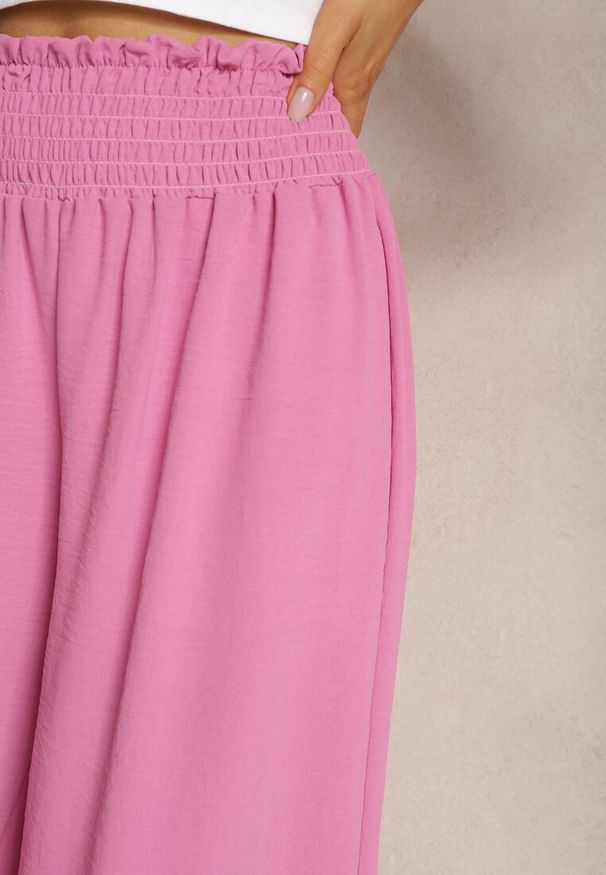 Renee - Różowe Spodnie High Waist z Szerokimi Nogawkami i Gumką w Pasie Risabessa. Okazja: na co dzień. Stan: podwyższony. Kolor: różowy. Styl: elegancki, casual