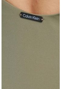 Calvin Klein jednoczęściowy strój kąpielowy kolor zielony miękka miseczka. Kolor: zielony. Materiał: włókno, dzianina, materiał. Wzór: gładki #2