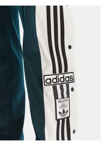 Adidas - adidas Spodnie dresowe Adibreak JV7515 Zielony Loose Fit. Kolor: zielony. Materiał: syntetyk #3