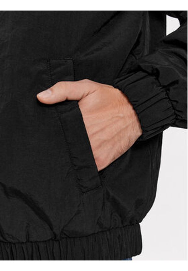 Tommy Jeans Kurtka bomber Essential DM0DM17238 Czarny Relaxed Fit. Kolor: czarny. Materiał: syntetyk