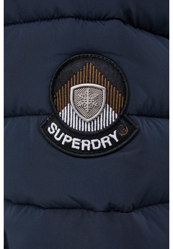 Superdry Kurtka damska kolor granatowy zimowa. Okazja: na co dzień. Kolor: niebieski. Materiał: futro. Sezon: zima. Styl: casual