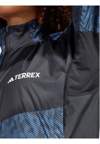 Adidas - adidas Wiatrówka Terrex Trail Running Windbreaker IA1808 Niebieski Regular Fit. Kolor: niebieski. Materiał: syntetyk. Sport: bieganie
