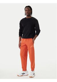 Adidas - adidas Spodnie dresowe Z.N.E. KE4686 Pomarańczowy Regular Fit. Kolor: pomarańczowy. Materiał: bawełna #3