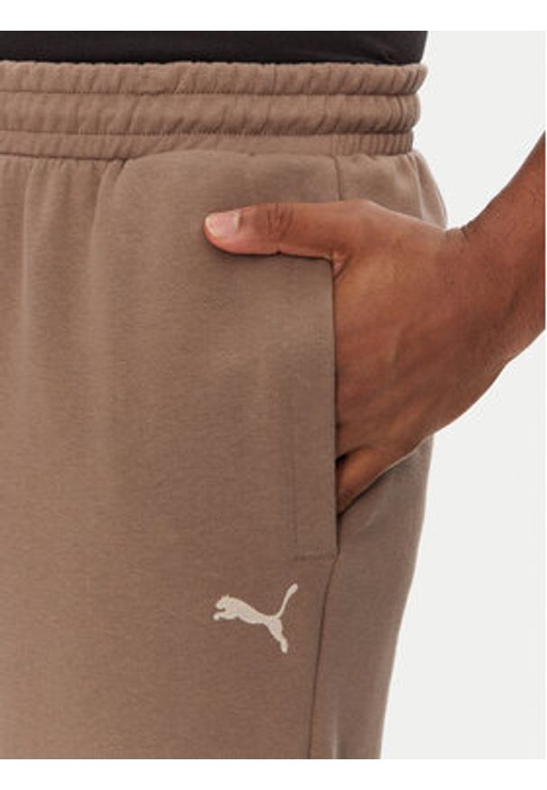 Puma Spodnie dresowe Ess 629651 Brązowy Relaxed Fit. Kolor: brązowy. Materiał: bawełna