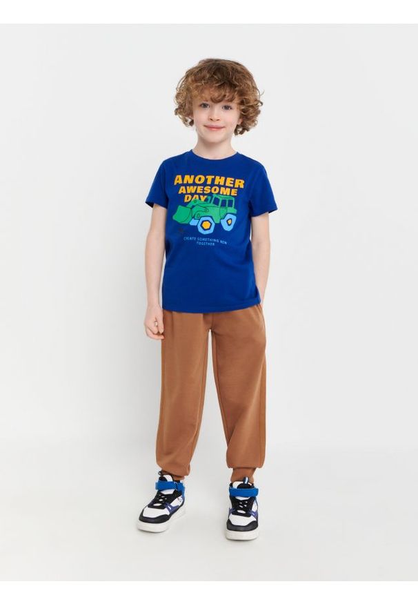 Sinsay - Spodnie dresowe jogger - beżowy. Kolor: beżowy. Materiał: dresówka