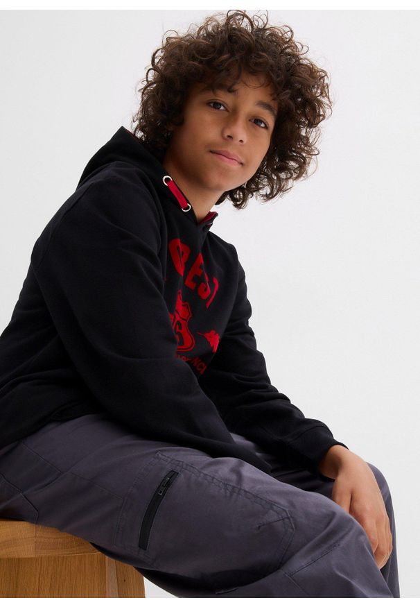 bonprix - Ocieplane spodnie bojówki z dżersejową podszewką o kroju loose fit. Kolor: szary. Materiał: jersey