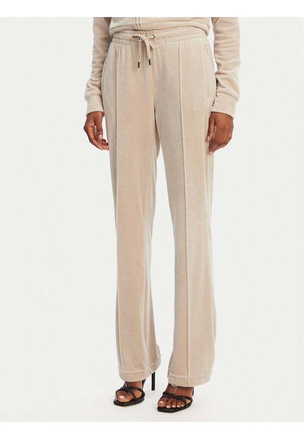 Juicy Couture Spodnie dresowe Tina JCAPW045 Beżowy Regular Fit. Kolor: beżowy. Materiał: syntetyk