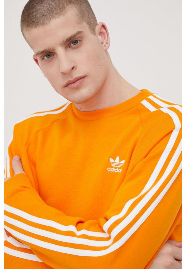 adidas Originals bluza Adicolor HE9485 męska kolor pomarańczowy z aplikacją. Kolor: pomarańczowy. Materiał: poliester, bawełna. Długość rękawa: raglanowy rękaw. Wzór: aplikacja