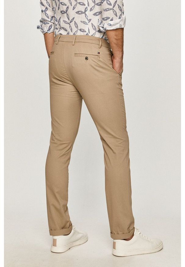 TOMMY HILFIGER - Tommy Hilfiger - Spodnie. Okazja: na co dzień. Kolor: beżowy. Styl: casual