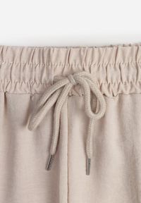 Renee - Beżowe Spodnieo Luźnym Fasonie ze Sznurkiem i Gumką w Talii Enivea. Okazja: na co dzień. Kolor: beżowy. Styl: casual #8