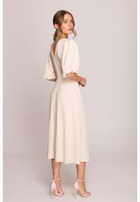 Stylove - Elegancka sukienka koktajlowa z bufiastymi rękawami kremowa. Okazja: na imprezę, na wesele, na ślub cywilny. Kolor: kremowy. Materiał: elastan, materiał. Długość rękawa: krótki rękaw. Sezon: lato. Typ sukienki: rozkloszowane. Styl: wizytowy, elegancki. Długość: midi #4