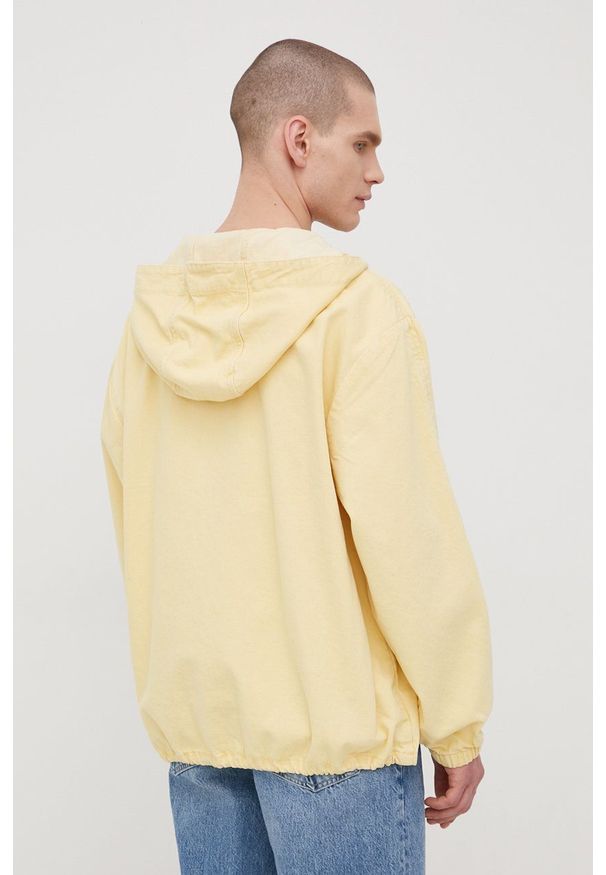 Levi's® - Levi's kurtka jeansowa bawełniana kolor żółty przejściowa oversize. Okazja: na spotkanie biznesowe. Kolor: żółty. Materiał: bawełna, jeans. Długość: krótkie. Styl: biznesowy