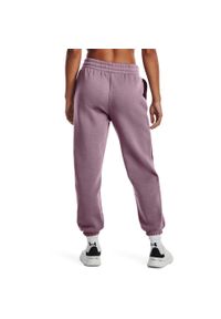 Spodnie Under Armour Essential Fleece Joggers, Kobiety. Kolor: fioletowy. Materiał: materiał, bawełna. Sport: bieganie