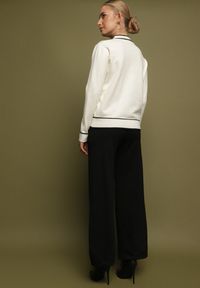 Born2be - Jasnobeżowy Dzianinowy Komplet Szerokie Spodnie i Kardigan z Lamówkami Gioresa. Kolor: beżowy. Materiał: dzianina. Wzór: gładki. Sport: turystyka piesza #7