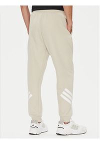 Adidas - adidas Spodnie dresowe Future Icons 3-Stripes JW7092 Beżowy Regular Fit. Kolor: beżowy. Materiał: bawełna #4