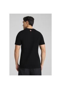 Puma - Męska koszulka Portugalia ftblNRGY PUMA Black. Kolor: czarny