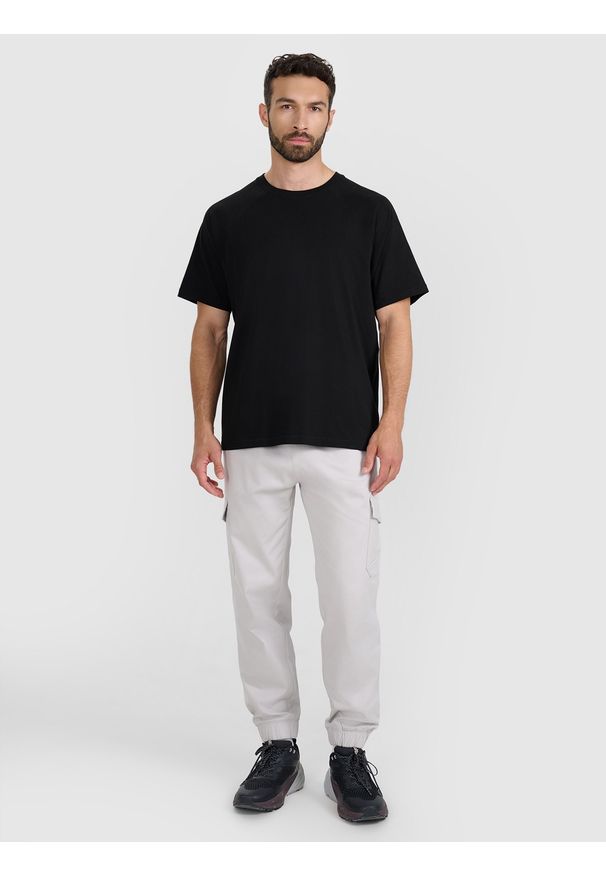 4f - 4F T-shirt oversize gładki męski - czarny S. Okazja: na co dzień. Kolor: czarny. Materiał: jersey, bawełna, materiał. Długość rękawa: krótki rękaw. Długość: krótkie. Wzór: gładki. Styl: casual, klasyczny, sportowy