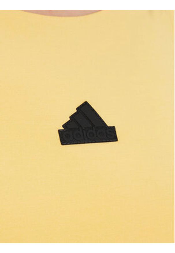 Adidas - adidas Top City Escape IS0668 Żółty Slim Fit. Kolor: żółty