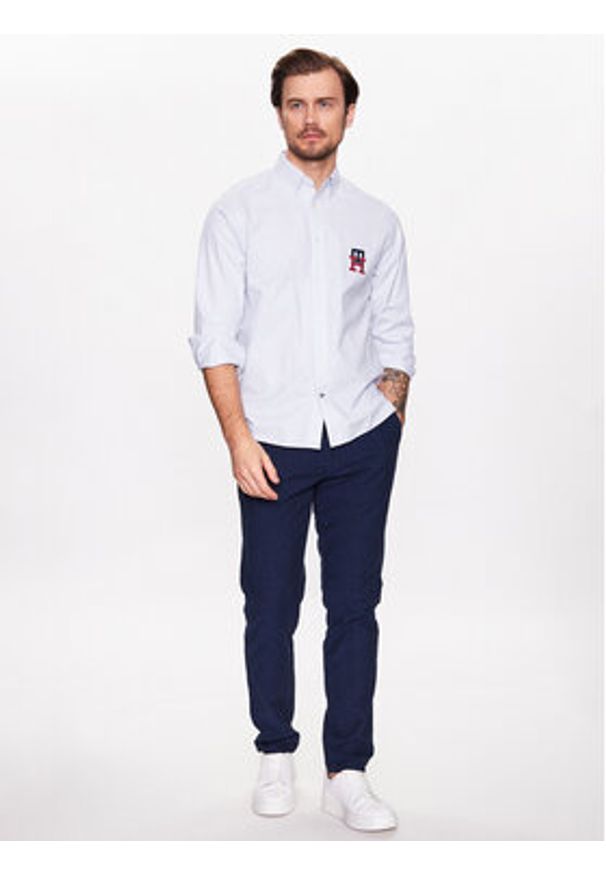 Lindbergh Spodnie materiałowe 30-008003 Niebieski Tapered Fit. Kolor: niebieski. Materiał: bawełna