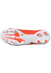 Adidas - Buty piłkarskie adidas X Speedflow.3 Fg Ll Jr FY3257 wielokolorowe pomarańcze i czerwienie. Kolor: wielokolorowy. Materiał: dzianina, syntetyk. Szerokość cholewki: normalna. Sport: piłka nożna #5