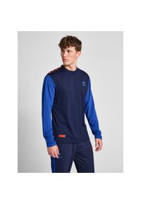 Dżersej z długim rękawem Hummel Pro Grid Game. Kolor: niebieski. Materiał: jersey. Długość rękawa: długi rękaw. Długość: długie. Wzór: nadruk #1