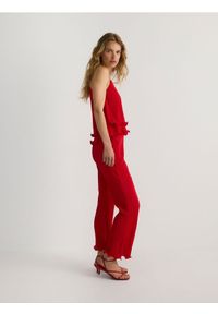 Reserved - Spodnie z falbanką - czerwony. Kolor: czerwony. Materiał: dzianina #1