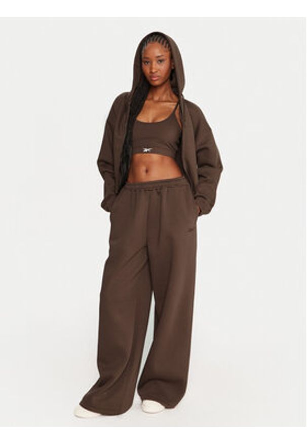 Reebok Spodnie dresowe Reebok X Ewa Chodakowska RK25306CCW Brązowy Regular Fit. Kolor: brązowy. Materiał: bawełna, syntetyk