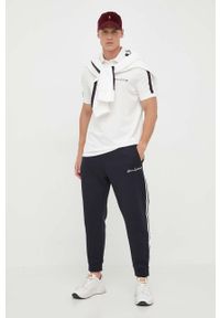 Armani Exchange spodnie dresowe kolor granatowy z aplikacją. Kolor: niebieski. Materiał: dresówka. Wzór: aplikacja #4