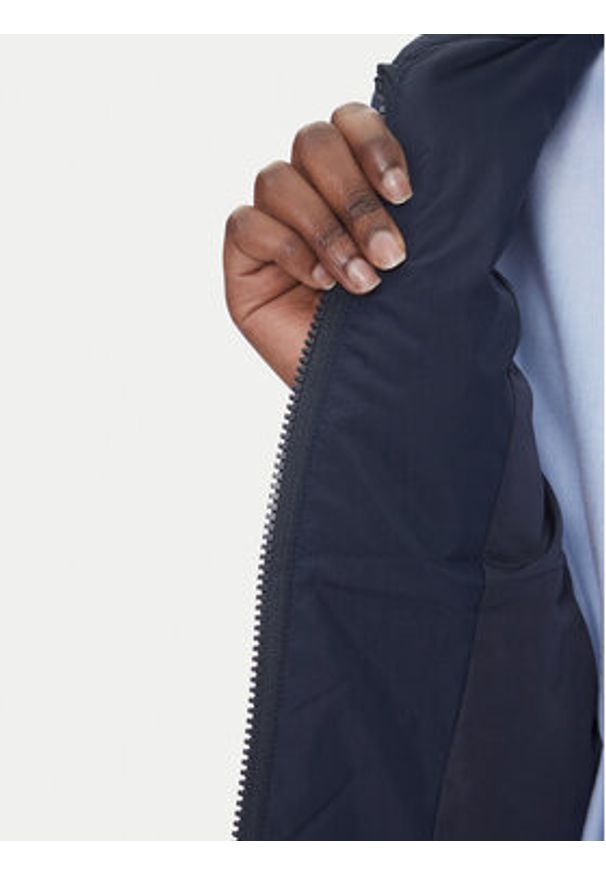 Tommy Jeans Bezrękawnik Onion DW0DW21184 Granatowy Regular Fit. Kolor: niebieski. Materiał: syntetyk. Długość rękawa: bez rękawów