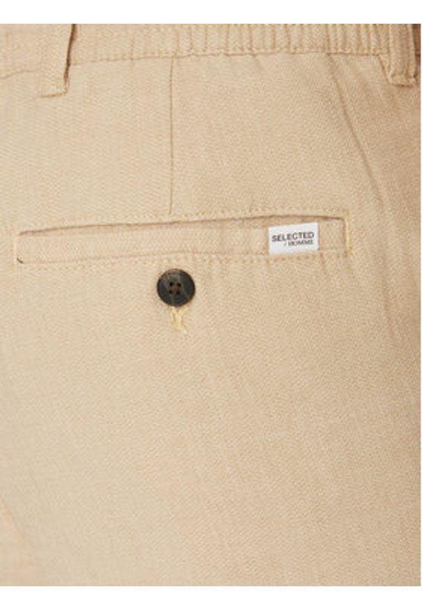 Selected Homme Chinosy 16096687 Beżowy Straight Fit. Kolor: beżowy. Materiał: len
