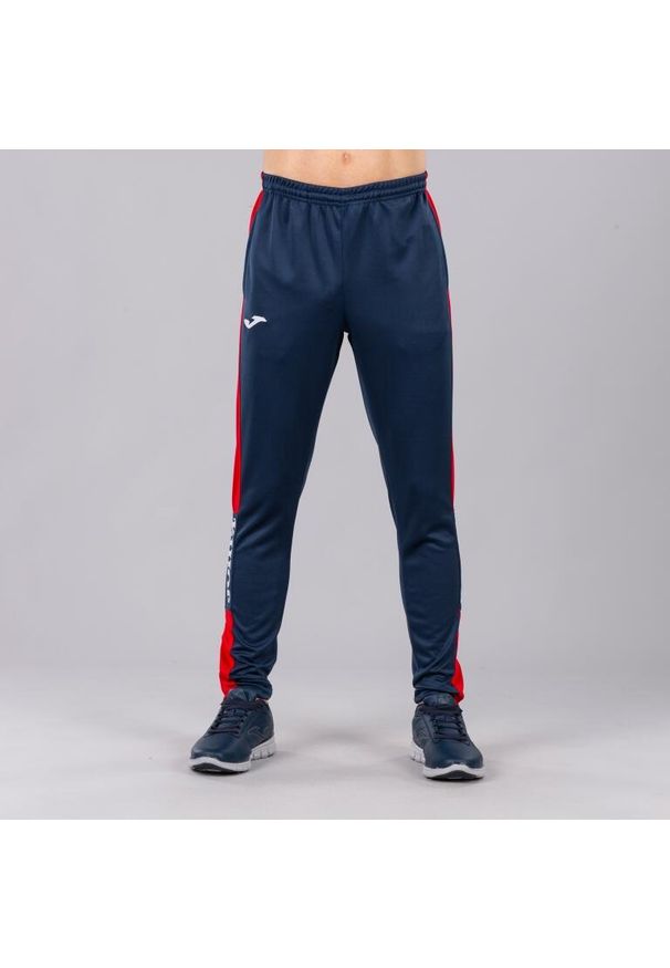 Spodnie do piłki nożnej męskie Joma Championship IV długie. Kolor: niebieski, czerwony, wielokolorowy. Materiał: dresówka. Sport: piłka nożna