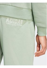 Adidas - adidas Spodnie dresowe IR8361 Zielony Regular Fit. Kolor: zielony. Materiał: bawełna #2