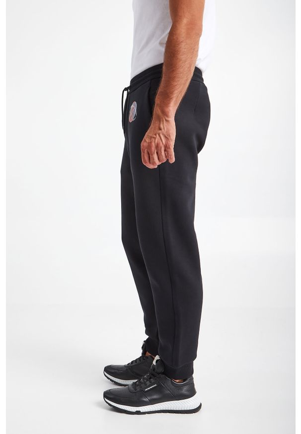 Emporio Armani - Spodnie dresowe EMPORIO ARMANI. Materiał: dresówka