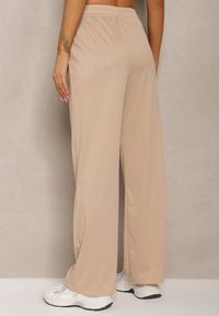 Renee - Beżowe Spodnie High Waist o Luźnym Fasonie z Łańcuszkiem przy Pasie Ustar. Okazja: do pracy, na co dzień. Stan: podwyższony. Kolor: beżowy. Długość: długie. Styl: casual