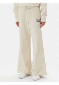 EA7 Emporio Armani Spodnie dresowe 7W000106 AF12473 U1079 Beżowy Loose Fit. Kolor: beżowy. Materiał: bawełna