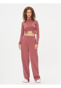 Reebok Spodnie dresowe Classics IL4648 Różowy Regular Fit. Kolor: różowy. Materiał: bawełna, dresówka #4
