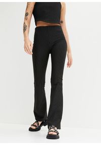 bonprix - Spodnie poszerzane w tenisowe prążki. Kolor: czarny. Wzór: prążki #1