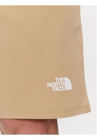 The North Face Szorty sportowe Graphic NF0A3S4F Beżowy Regular Fit. Kolor: beżowy. Materiał: bawełna. Styl: sportowy